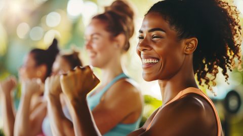 a diverse group of women happily doing various bicep exercises in a sunny, well-equipped gym