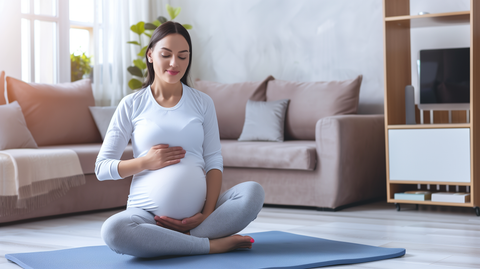 a pregnant woman sitting on an exercise mat in her living room, doing breathing exercises